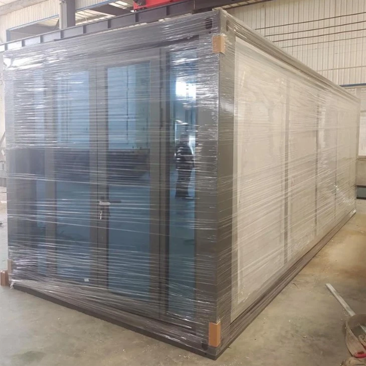 Packaged and expandable house Packaged and expandable house